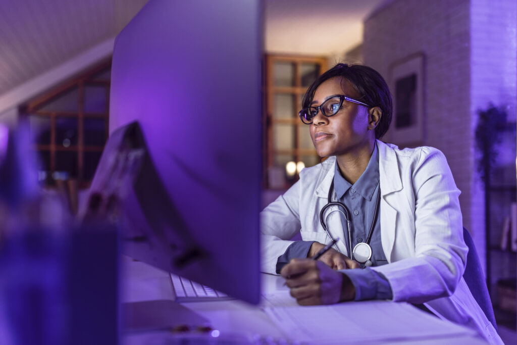 Doctor using computer