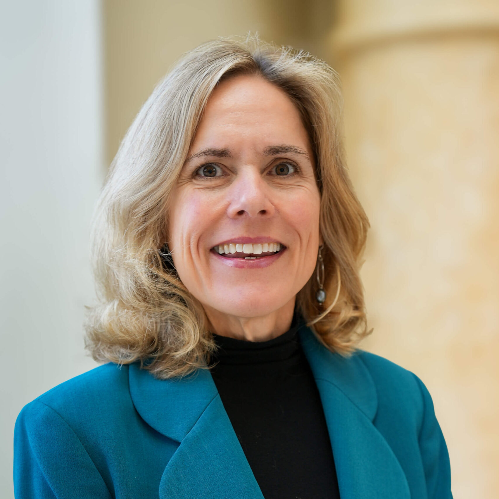 Headshot photo of Kelly Solomon