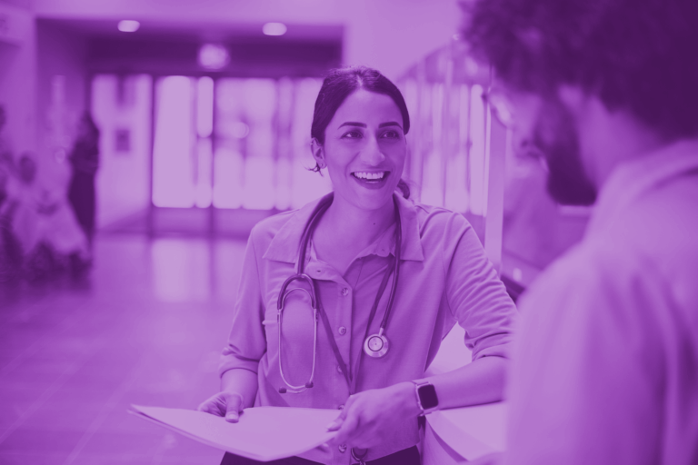 Doctors talking together at the counter