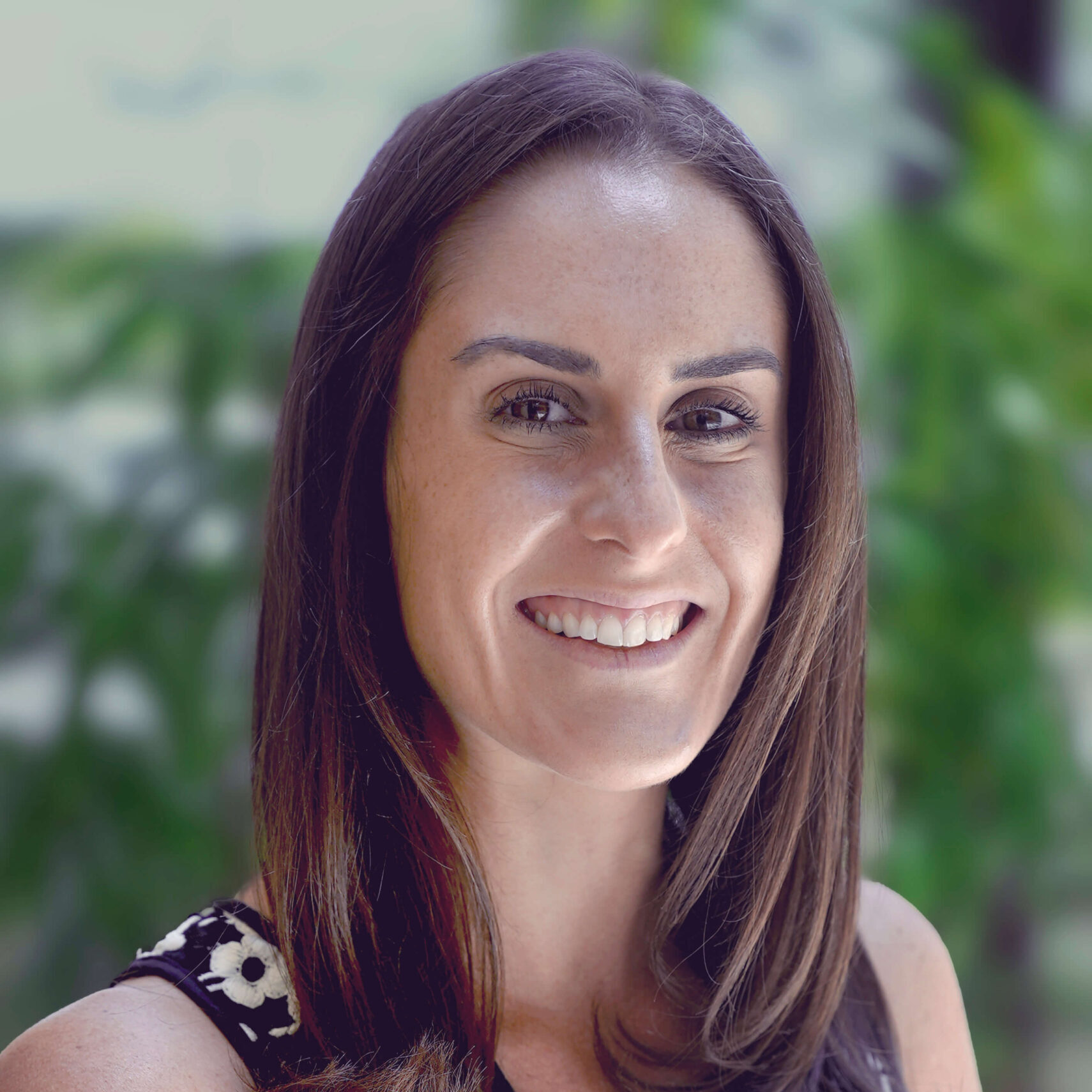 Headshot photos of Lauren Beach