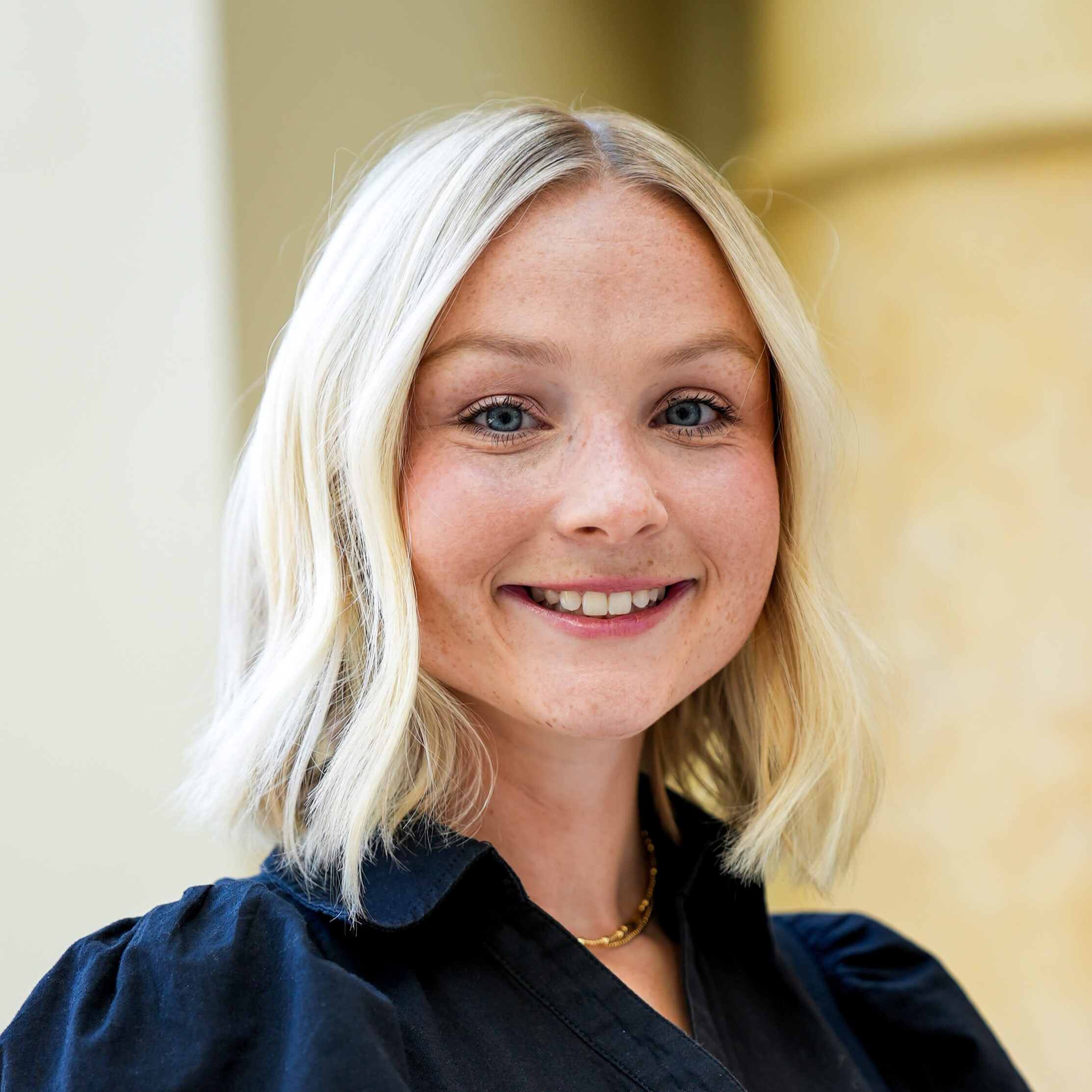 Headshot photo of Caitlin Elmore